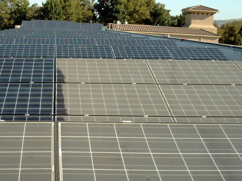 solar panel cleaner Adelaide Hills dirty panels being cleaned panels and cleaned solar panels